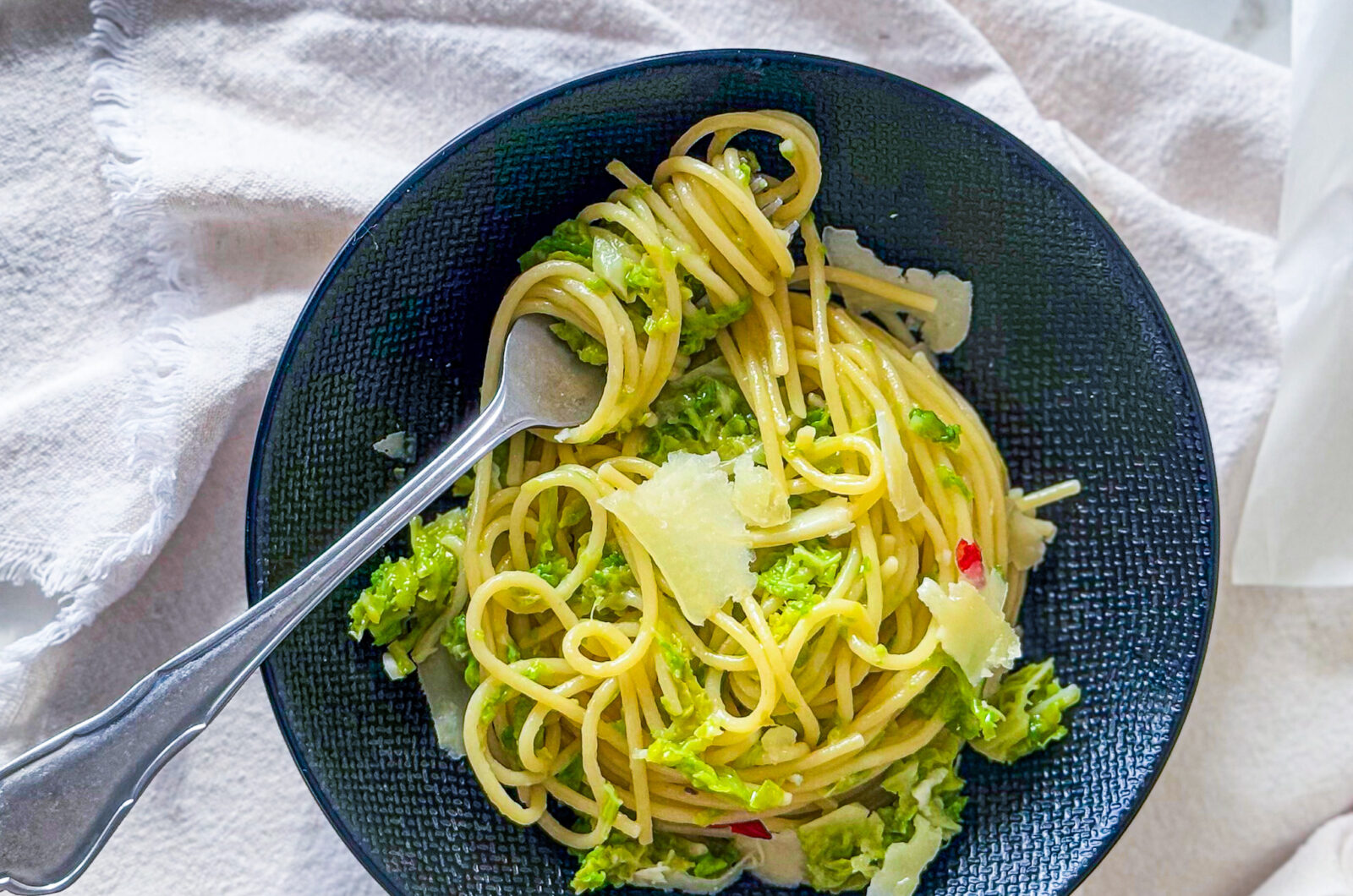 Spaghetti with braised savoy cabbage